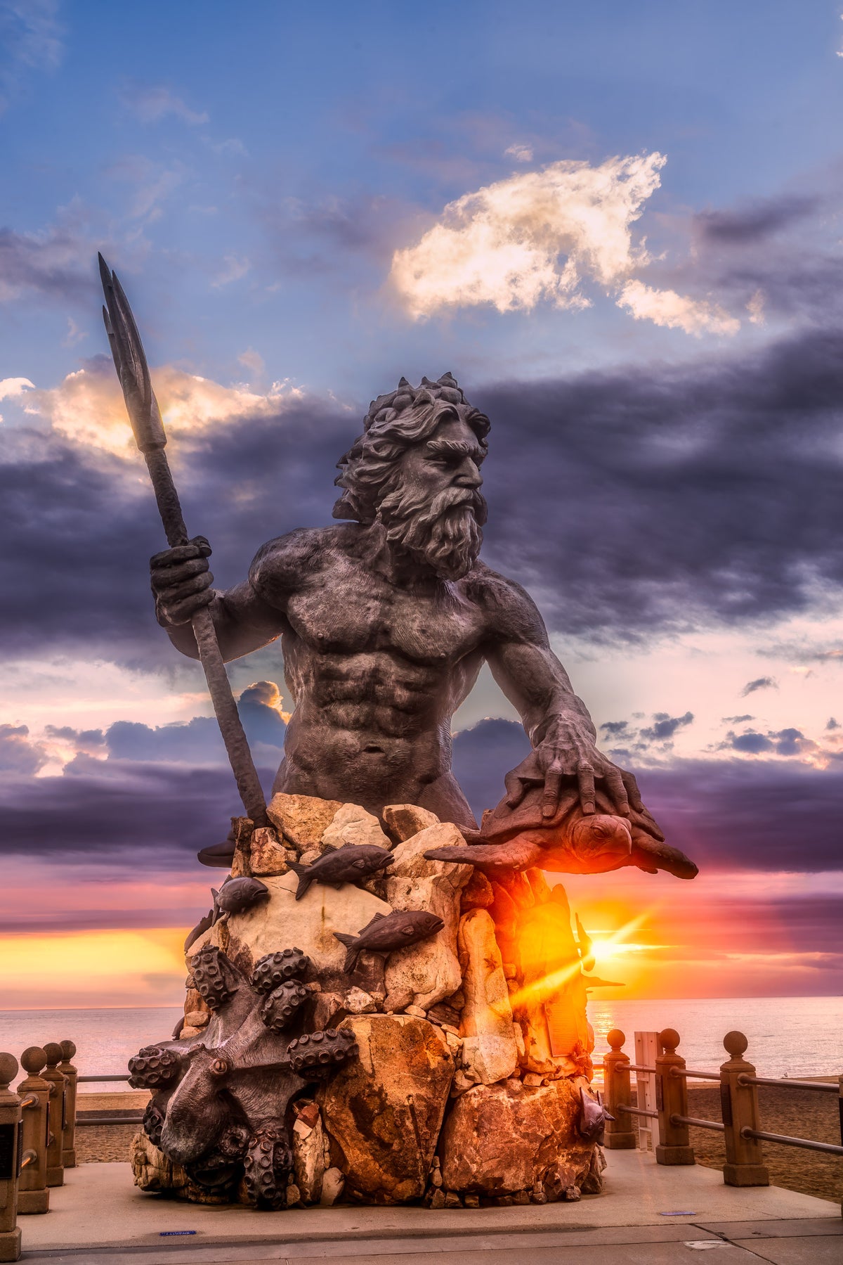 King Neptune statue at sunrise on the Virginia Beach oceanfront
