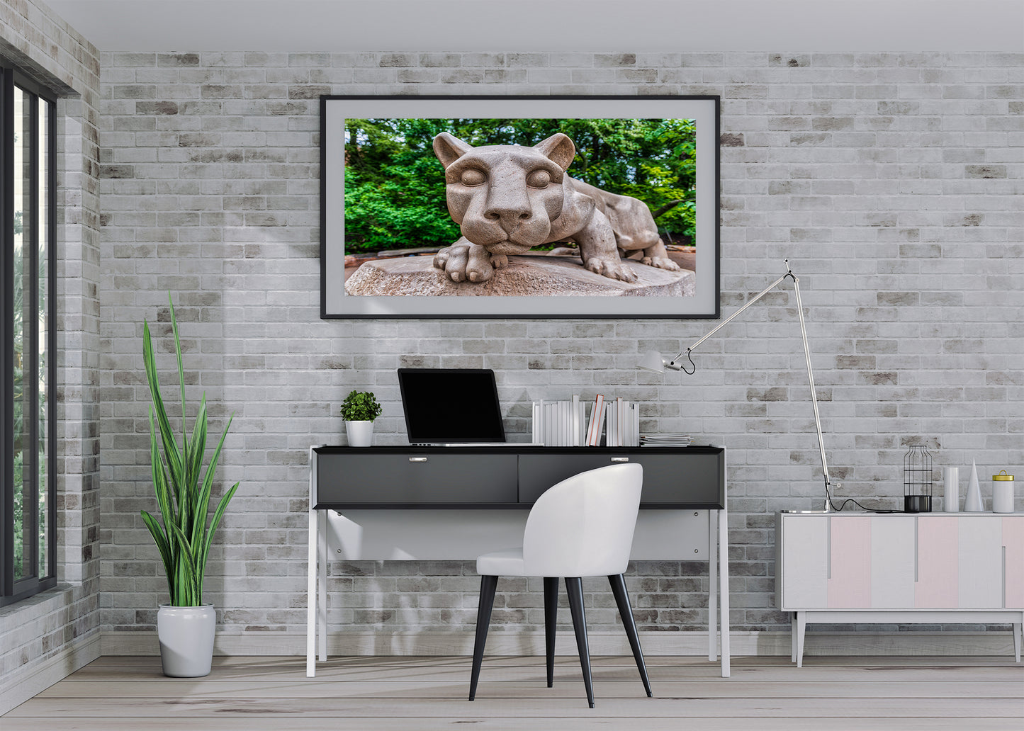 Cara a cara con la estatua del león Nittany