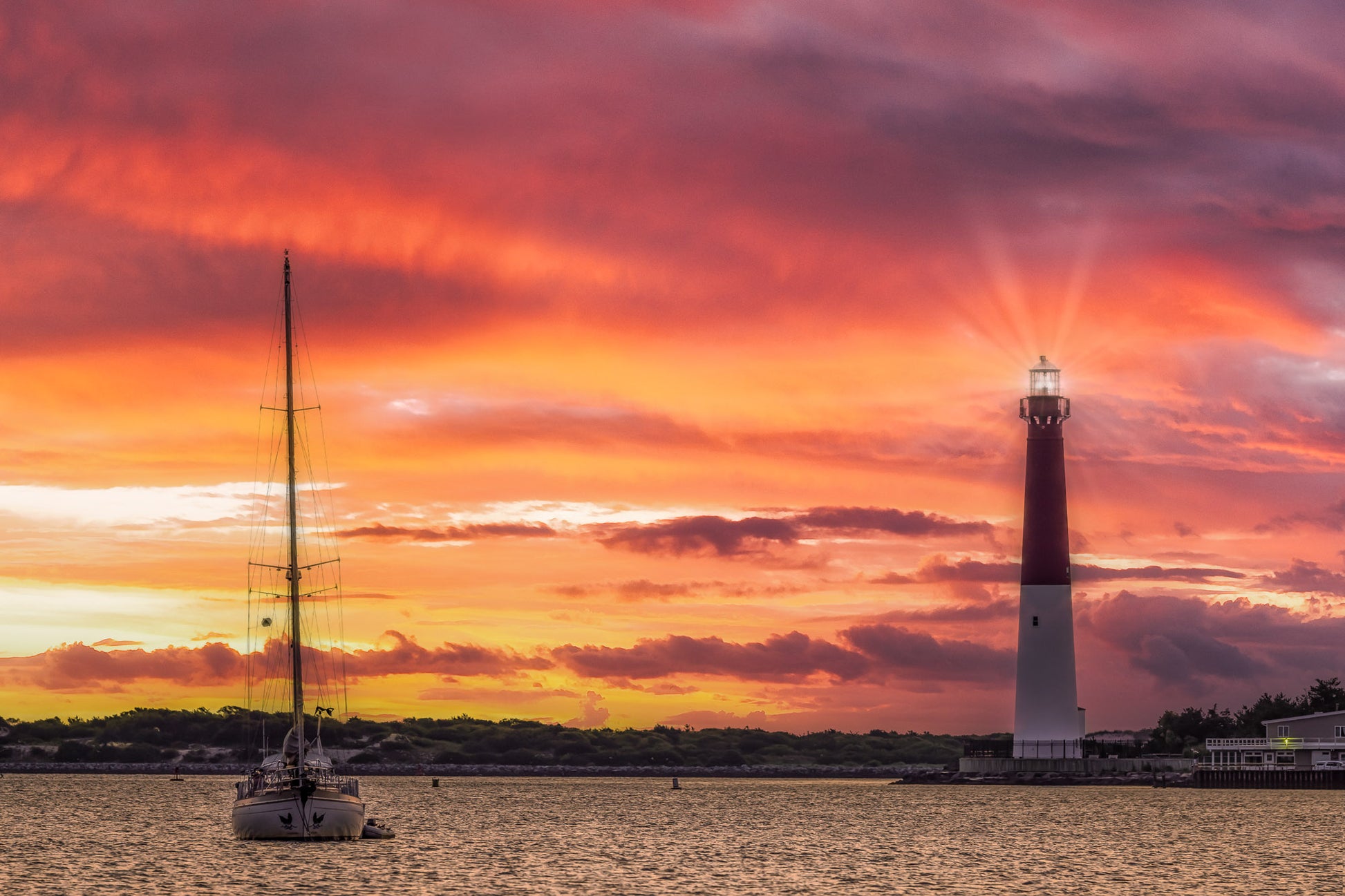 Sunrise Sailing at the Barnegat Lighthouse image 0
